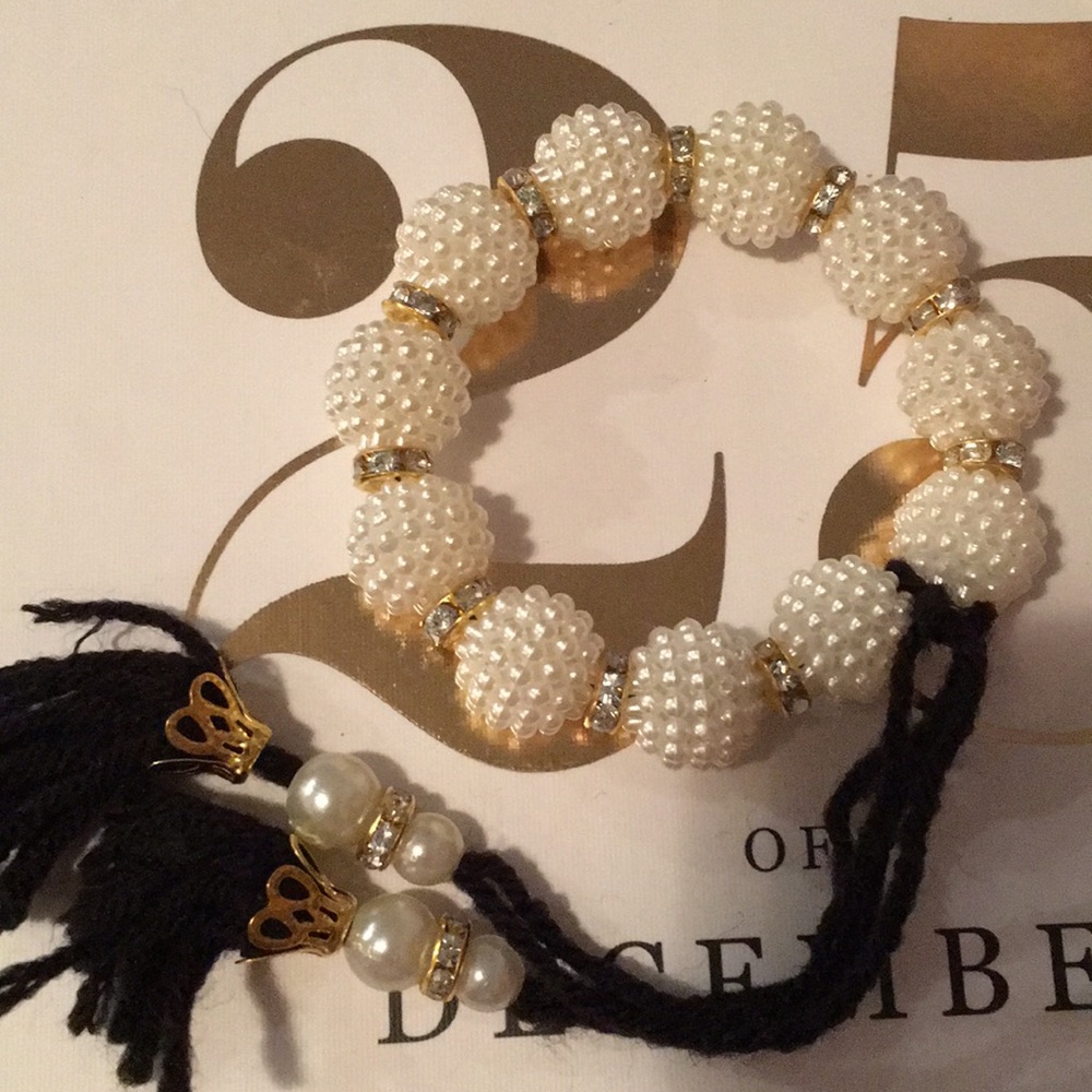 White pearl and diamond tie bracelet with tassels